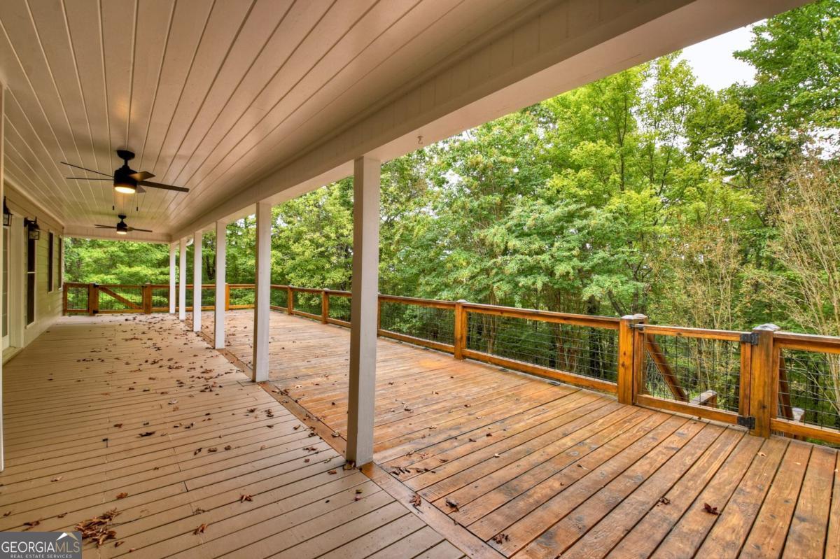 344 Cascade Lane Blue Ridge, GA 30513 - Photo 11 of 62 a view of balcony with wooden floor