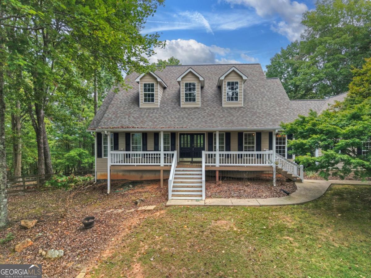 344 Cascade Lane Blue Ridge, GA 30513 - Photo 14 of 62 a front view of a house with a yard