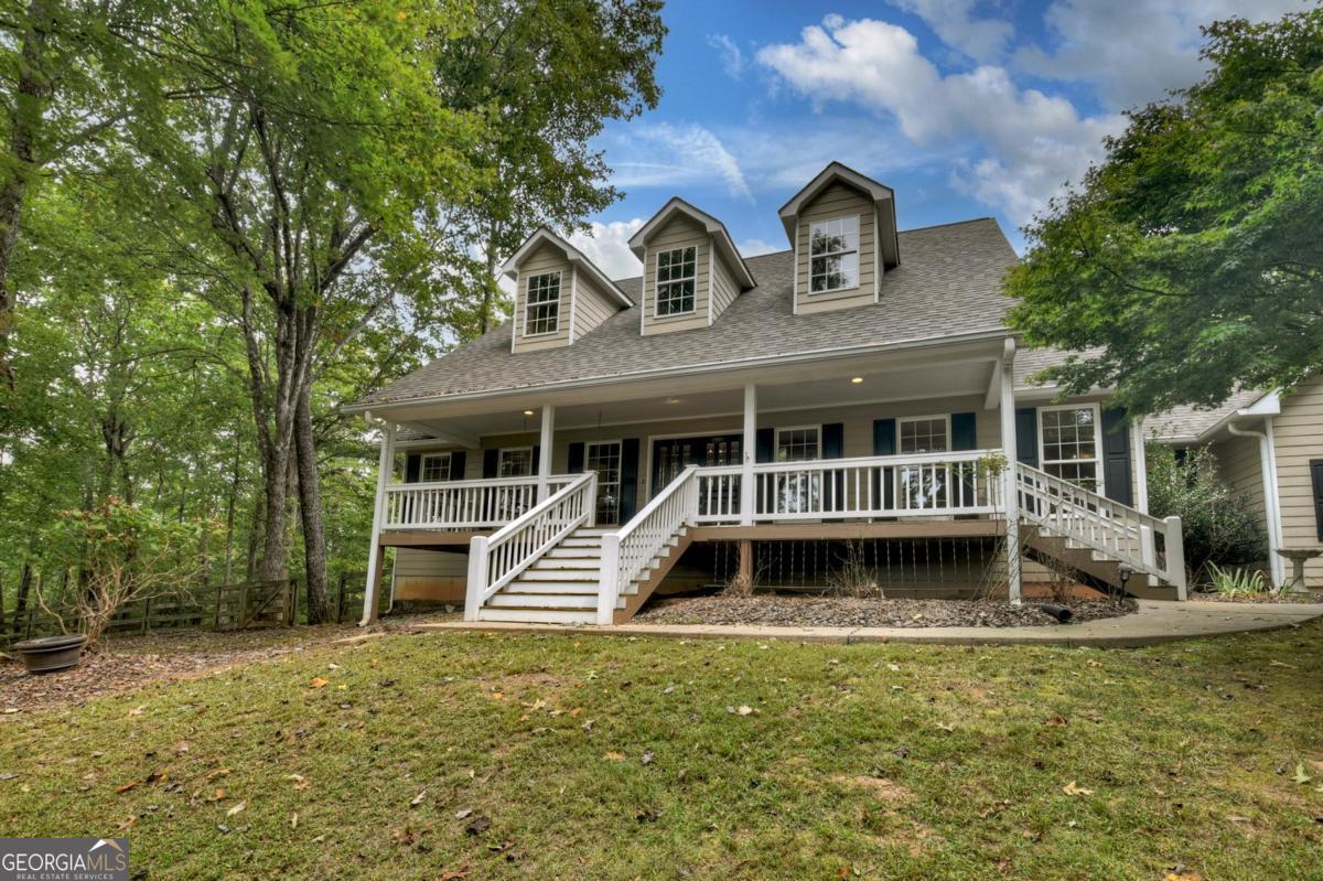 344 Cascade Lane Blue Ridge, GA 30513 - Photo 18 of 62 front view of a house with a yard