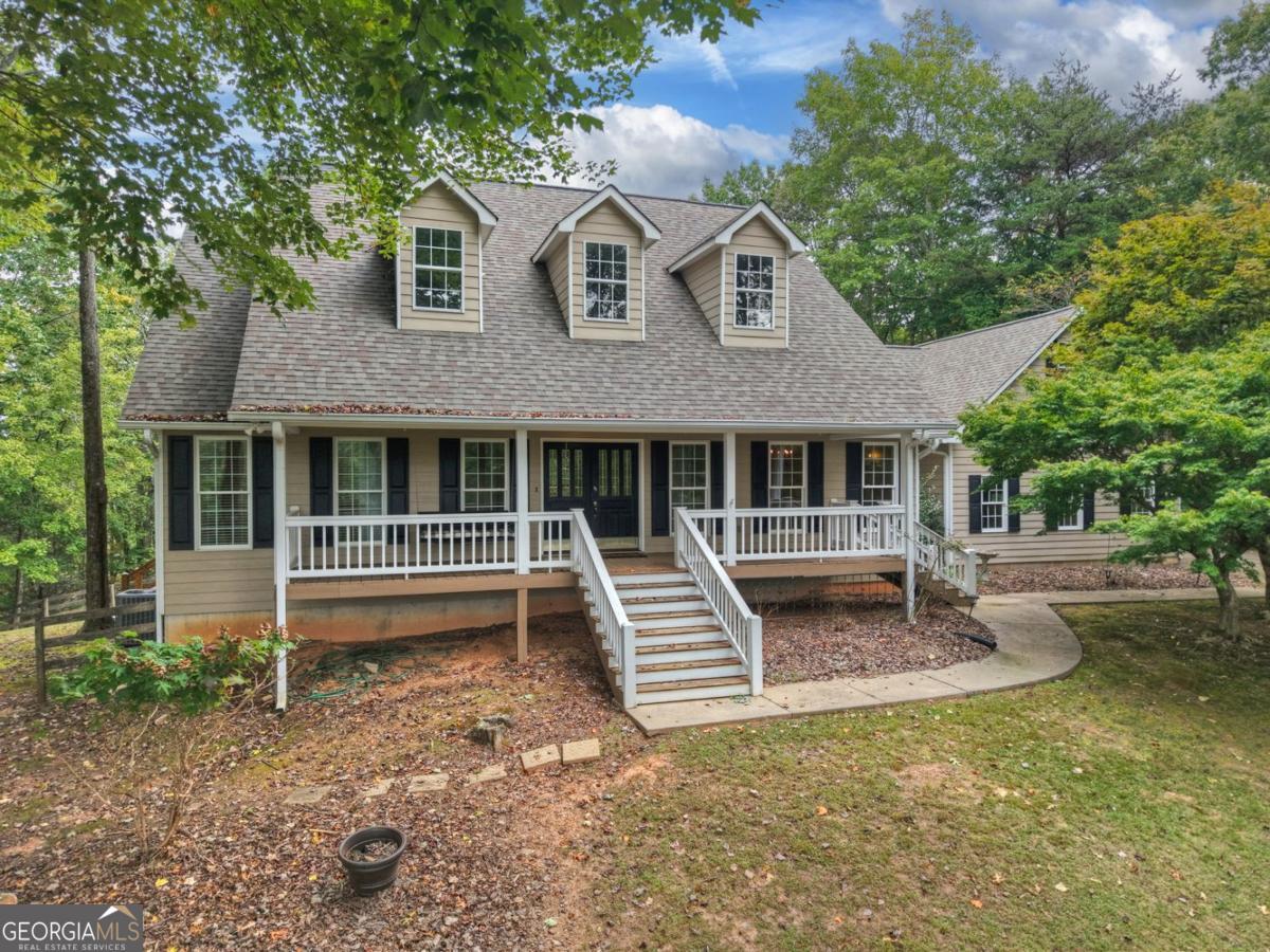 344 Cascade Lane Blue Ridge, GA 30513 - Photo 2 of 62 a front view of a house with a garden