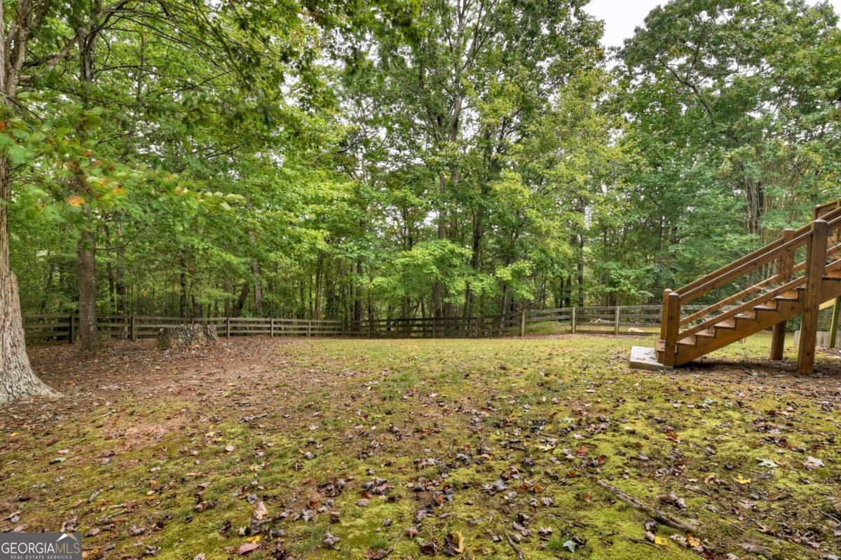 344 Cascade Lane Blue Ridge, GA 30513 - Photo 21 of 62 a view of a yard with a small house