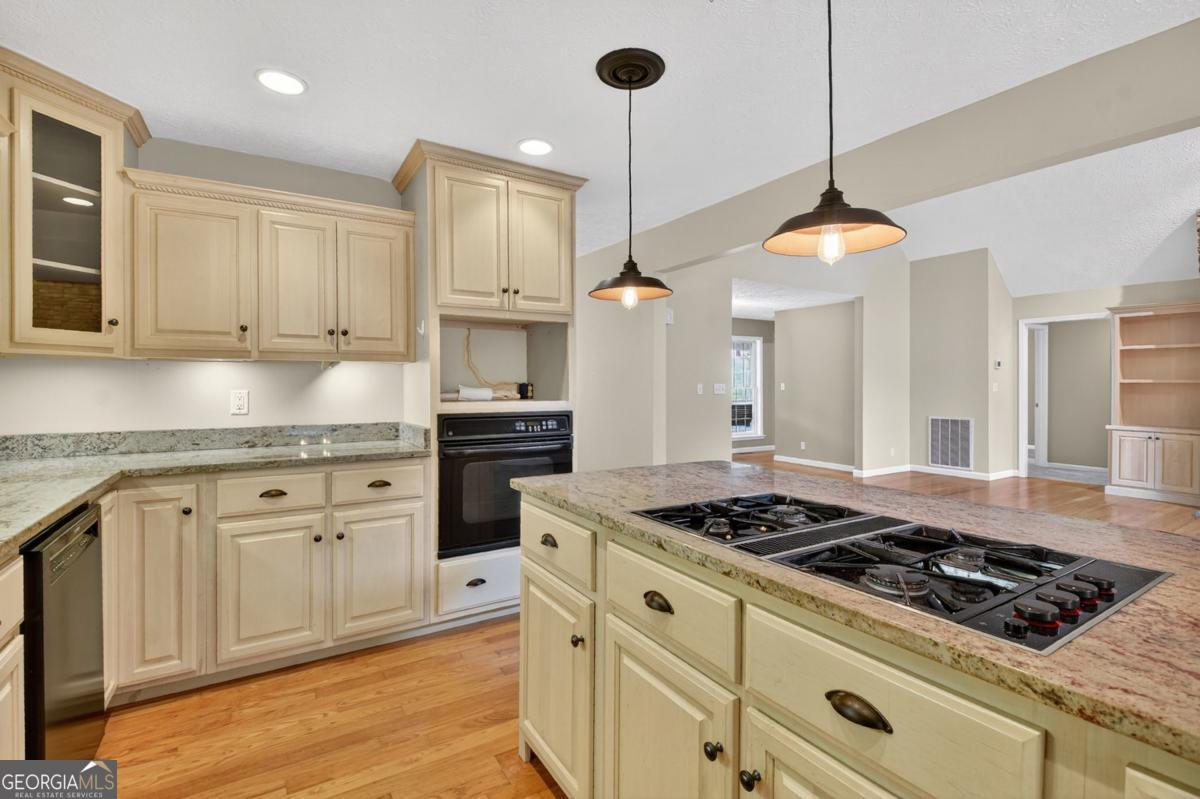 344 Cascade Lane Blue Ridge, GA 30513 - Photo 34 of 62 a kitchen with white cabinets and appliances