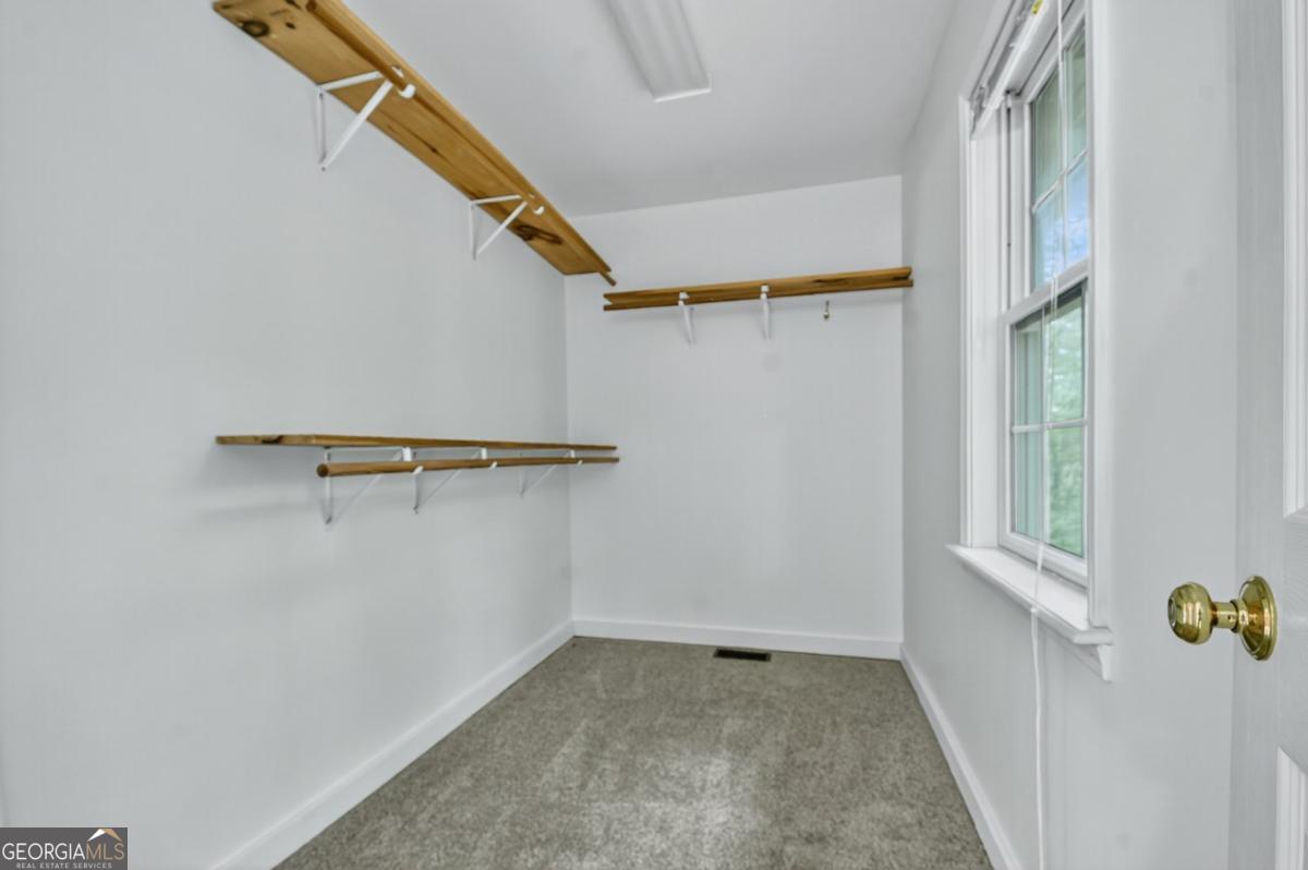 344 Cascade Lane Blue Ridge, GA 30513 - Photo 44 of 62 a view of an empty walk in closet