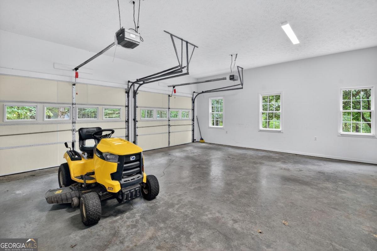 344 Cascade Lane Blue Ridge, GA 30513 - Photo 49 of 62 a view of a room with gym equipment