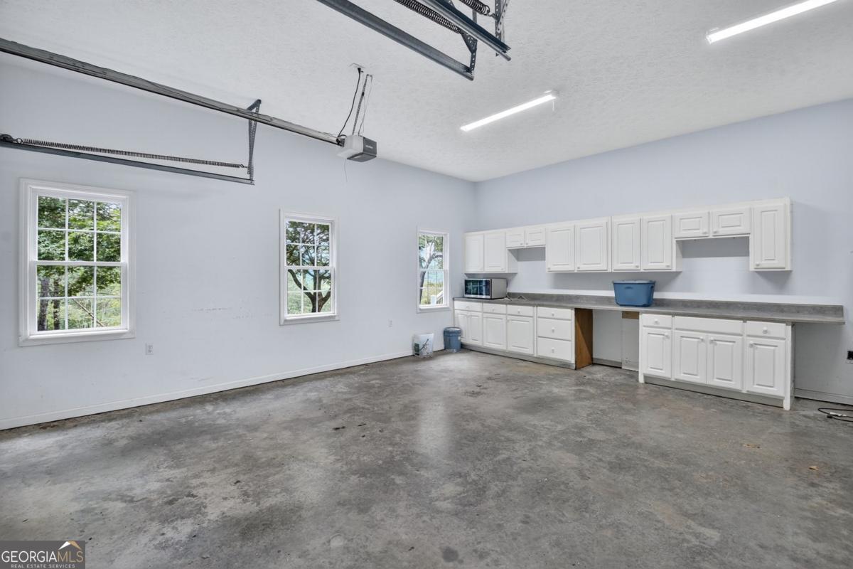 344 Cascade Lane Blue Ridge, GA 30513 - Photo 50 of 62 a view of kitchen with cabinets and window