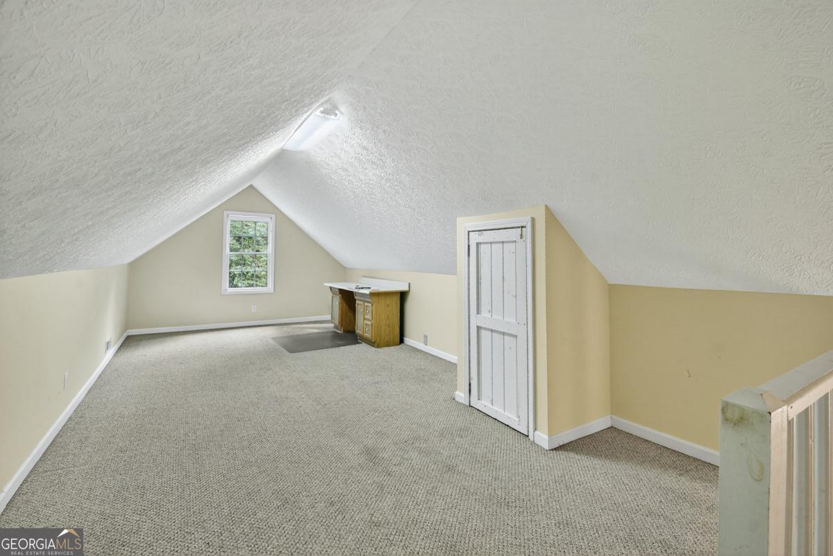 344 Cascade Lane Blue Ridge, GA 30513 - Photo 51 of 62 a view of an empty room with a window