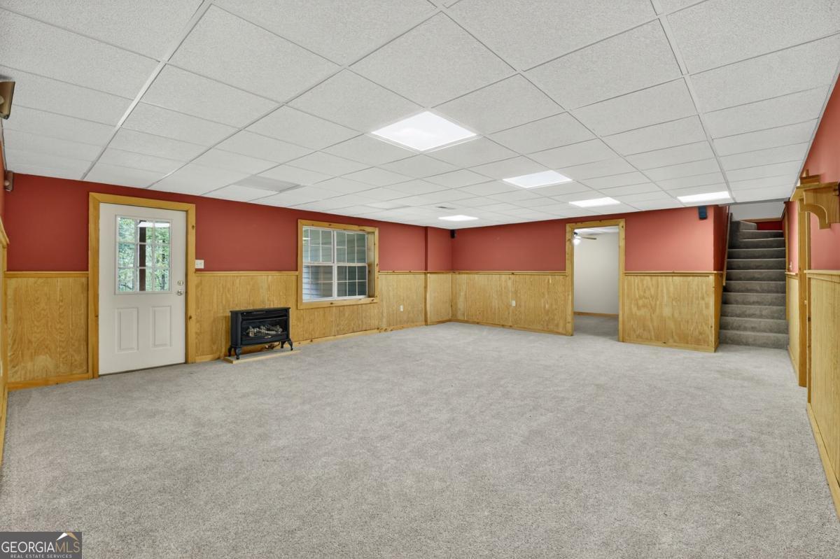 344 Cascade Lane Blue Ridge, GA 30513 - Photo 53 of 62 a view of an empty room with a fireplace