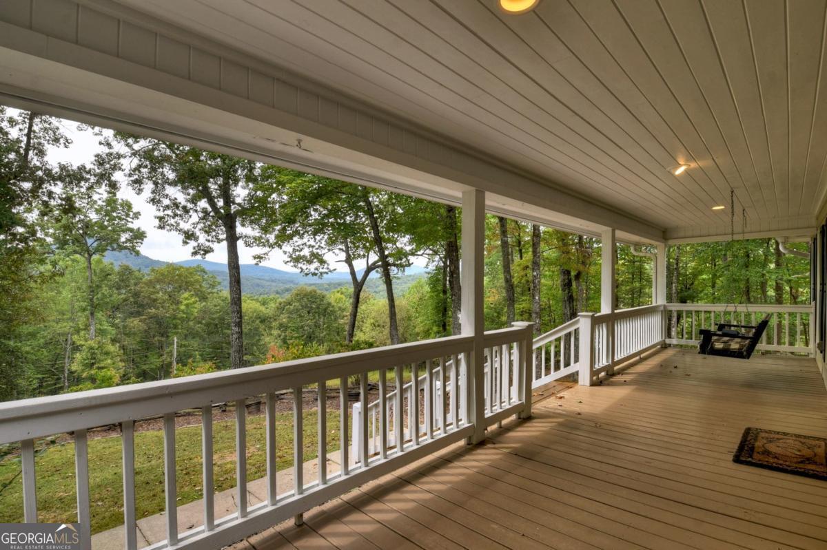 344 Cascade Lane Blue Ridge, GA 30513 - Photo 6 of 62 a view of two chairs in the balcony