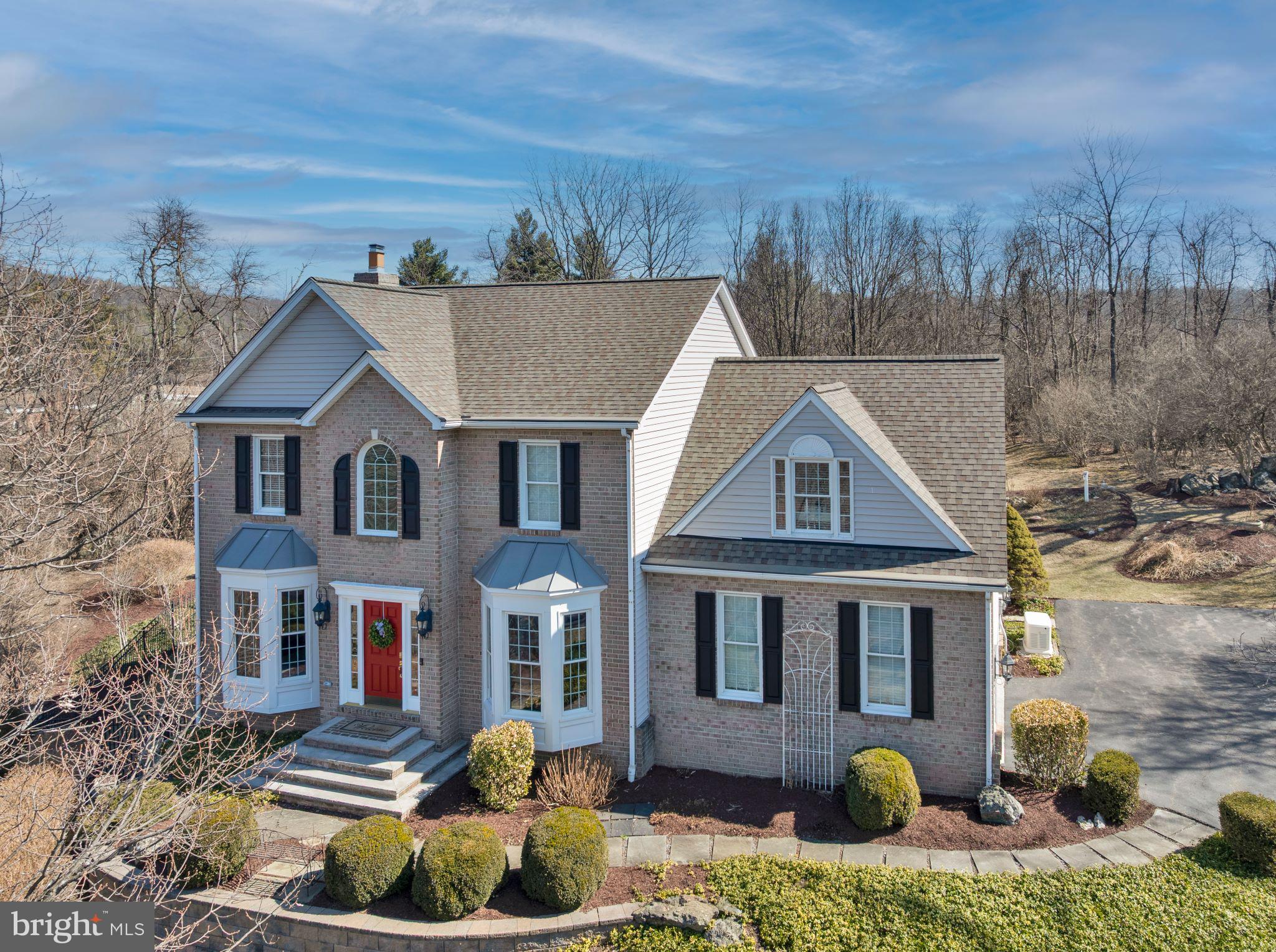 8029 Ridge Road Frederick, MD 21702 - Photo 1 of 91 a front view of a house with a yard