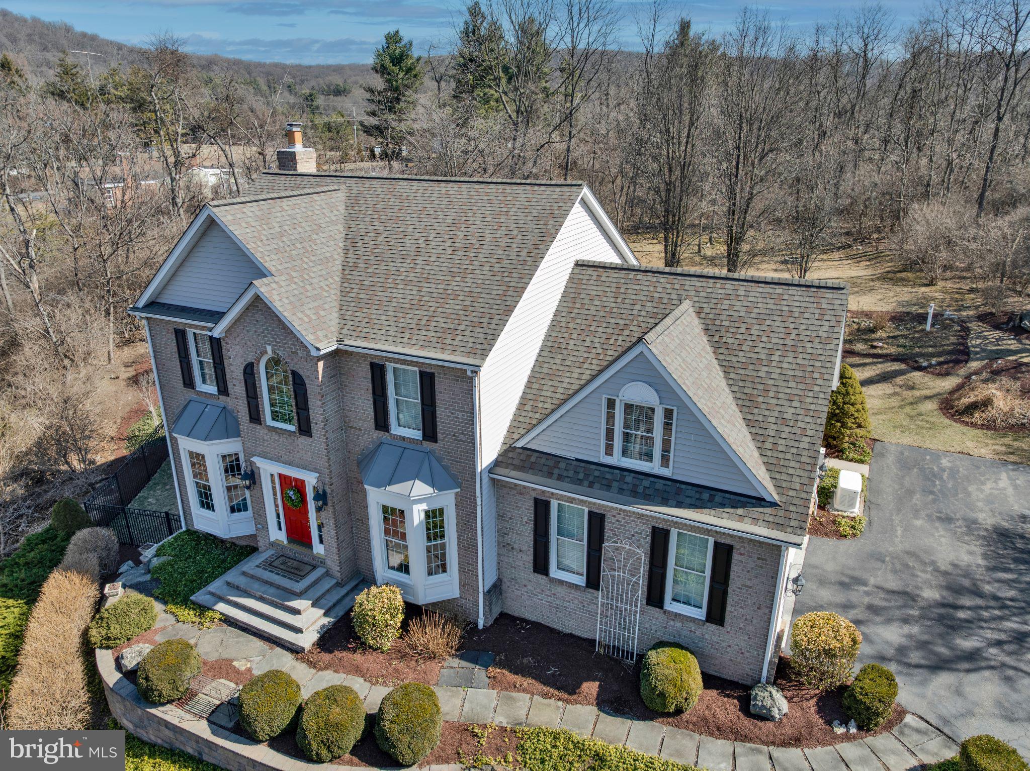 8029 Ridge Road Frederick, MD 21702 - Photo 2 of 91 a aerial view of a house with tub and trees