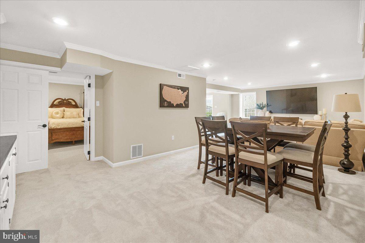 8029 Ridge Road Frederick, MD 21702 - Photo 58 of 91 a view of a dining room with furniture