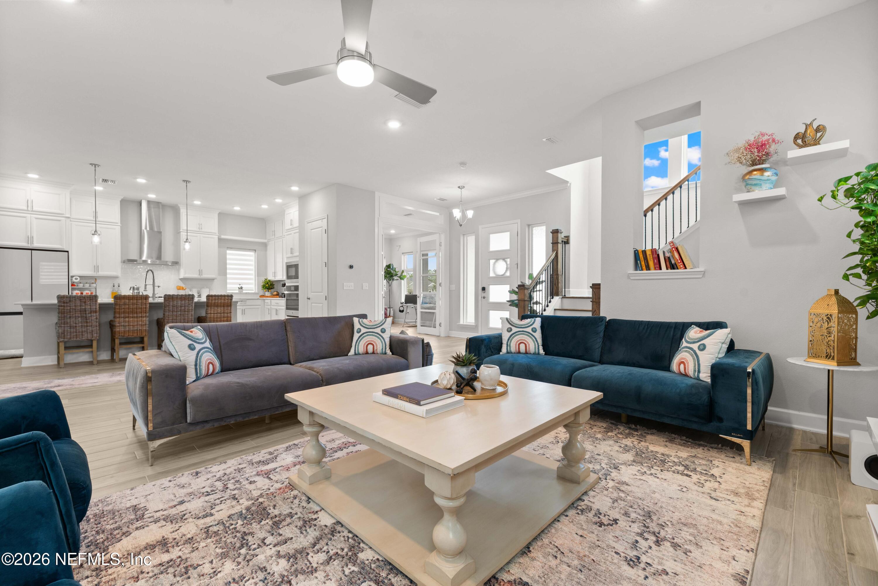 5270 Piney Flats Road Jacksonville, FL 32224 - Photo 11 of 53 a living room with furniture and a view of kitchen