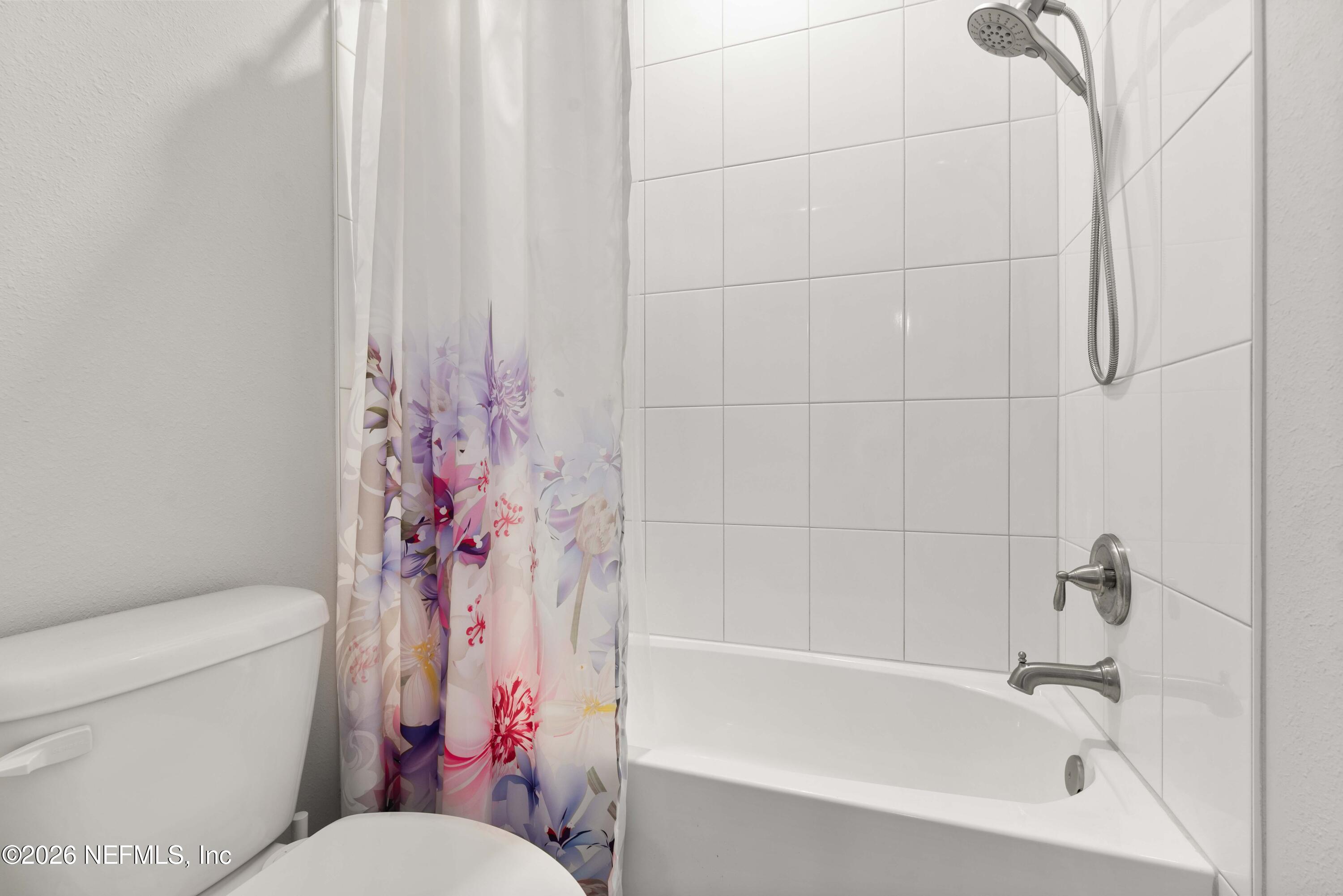 5270 Piney Flats Road Jacksonville, FL 32224 - Photo 36 of 53 a white toilet sitting next to a bath tub