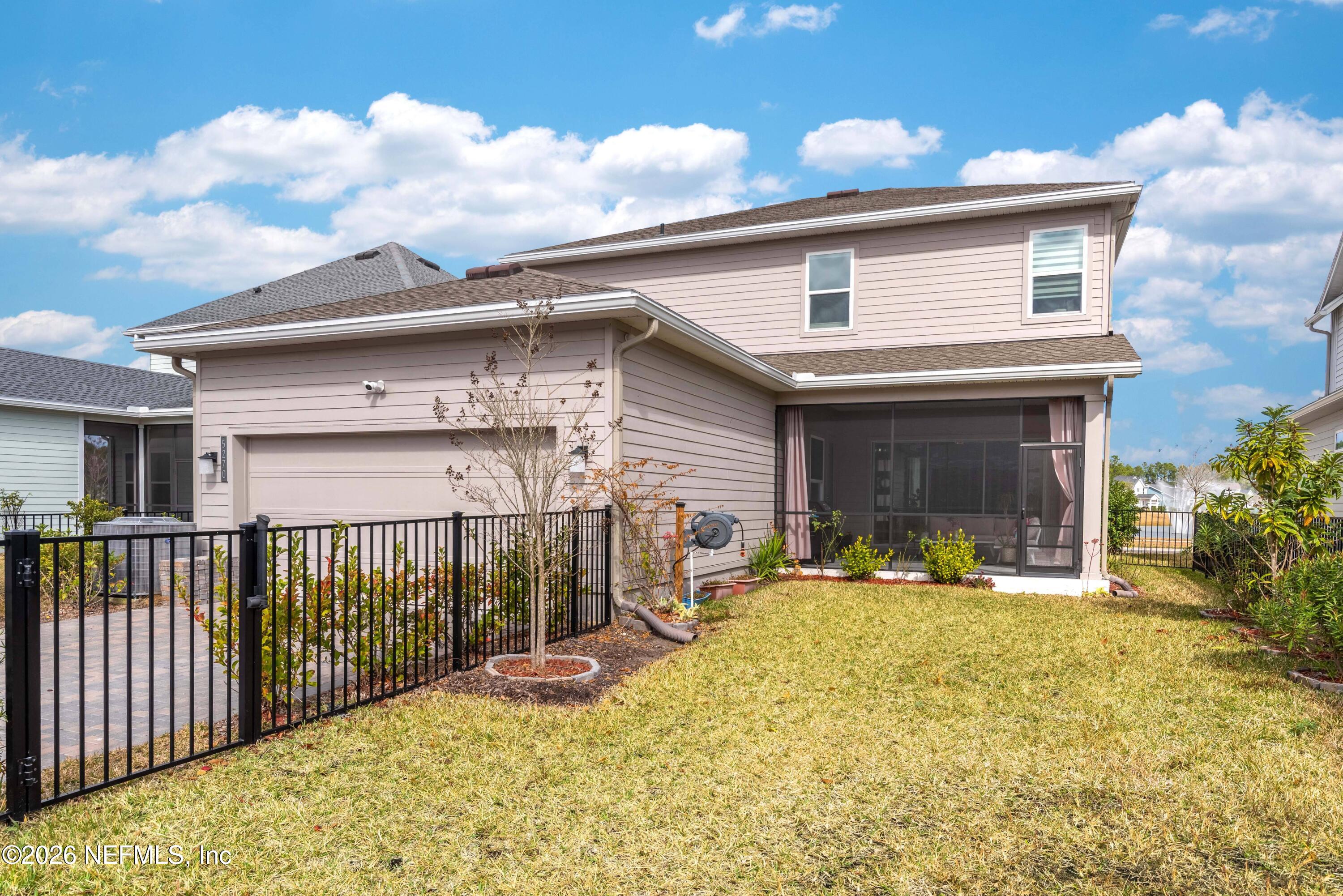 5270 Piney Flats Road Jacksonville, FL 32224 - Photo 46 of 53 a view of a house with a patio and a yard
