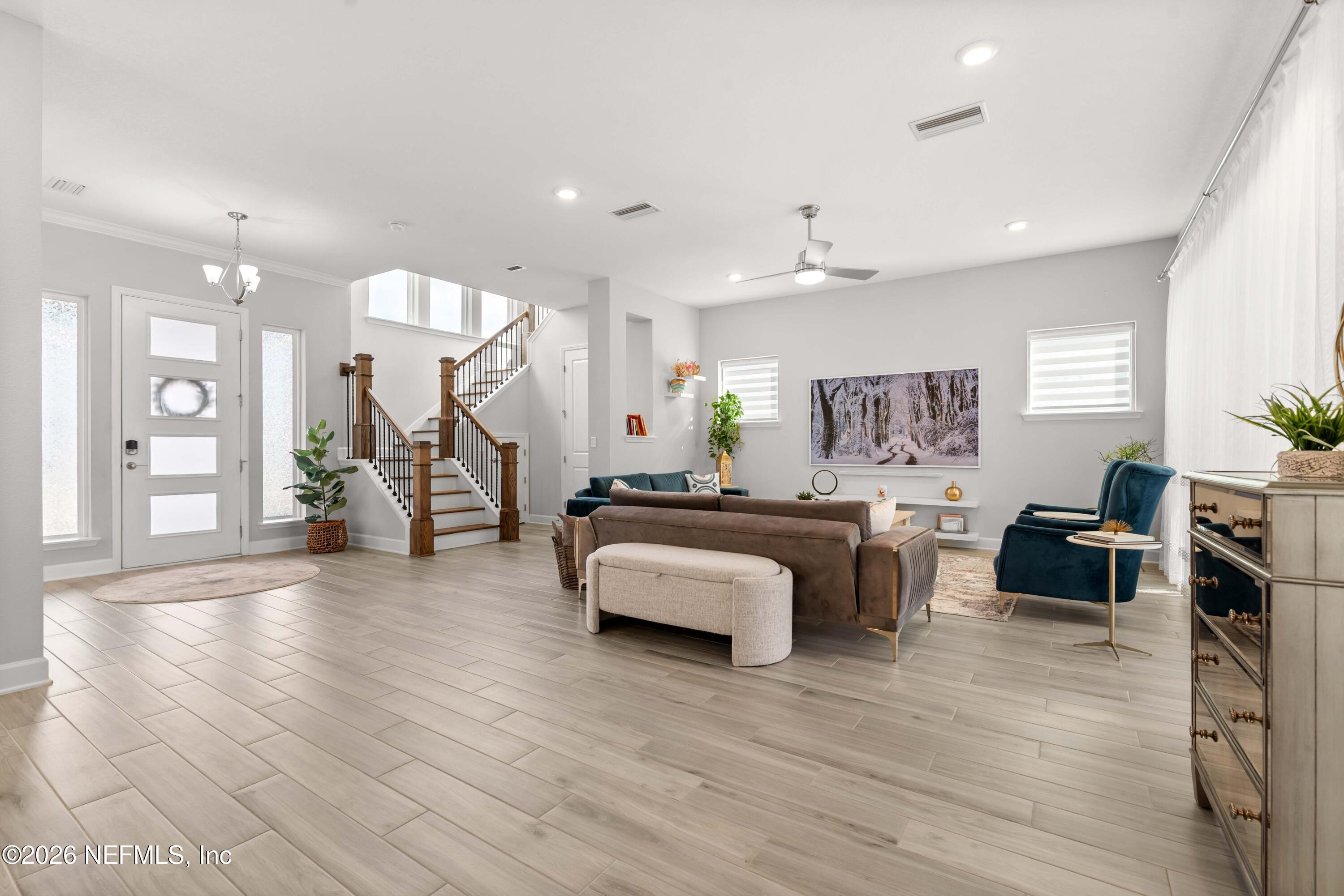 5270 Piney Flats Road Jacksonville, FL 32224 - Photo 9 of 53 a living room with furniture and wooden floor