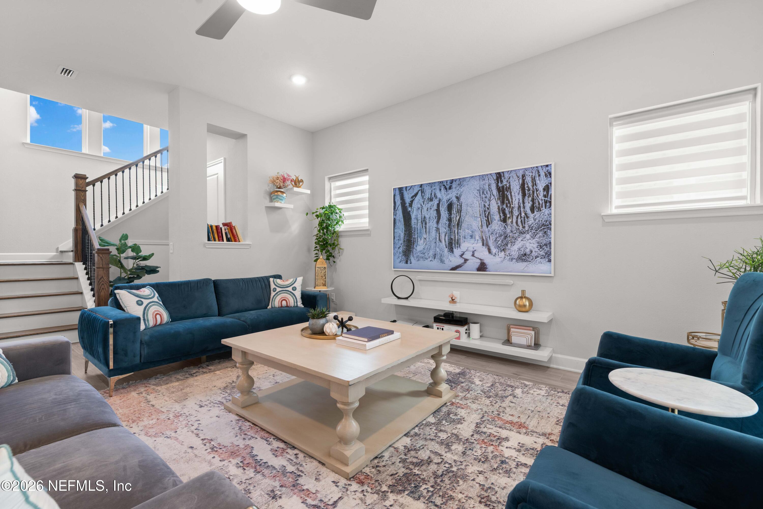 5270 Piney Flats Road Jacksonville, FL 32224 - Photo 10 of 53 a living room with furniture a rug and a window