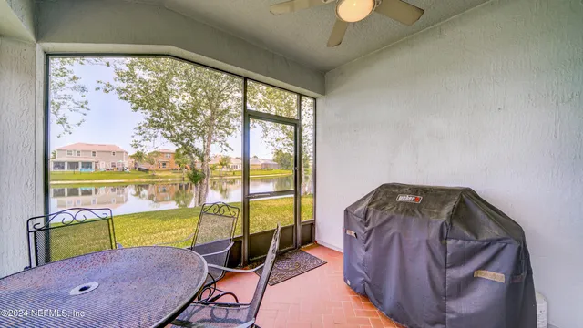 a room with gym equipment and a large window