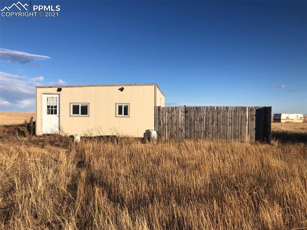 10457 Edison Road Yoder, CO 80864 - Photo 14 of 21 a view of a back yard