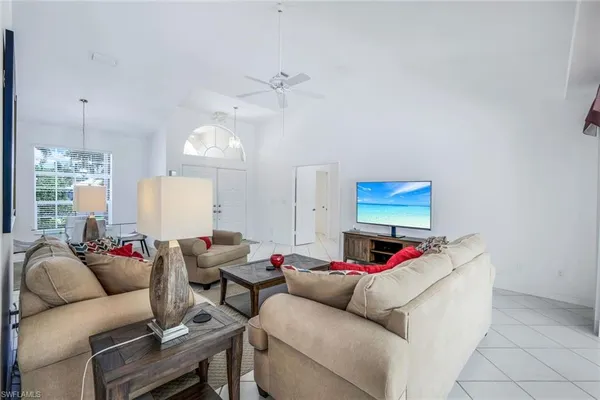 a living room with furniture and window