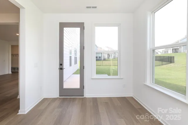 an empty room with windows