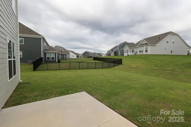 a view of a back yard of the house
