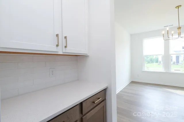 a room with a sink and a window