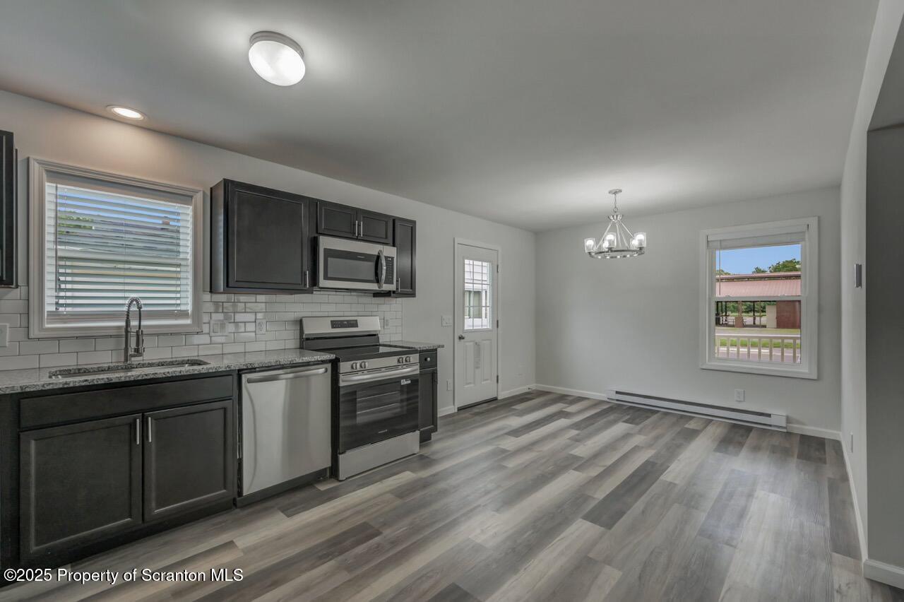 308 Hill Street Jessup, PA 18434 - Photo 12 of 32 Kitchen with dining area