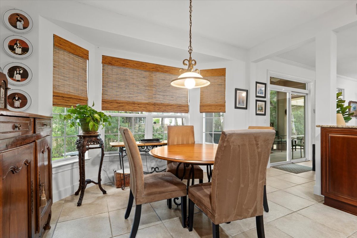503 Breezeway Lane Georgetown, TX 78633 - Photo 14 of 38 Light-filled breakfast area with bay window, creating a comfortable space for everyday dining with views of the backyard.