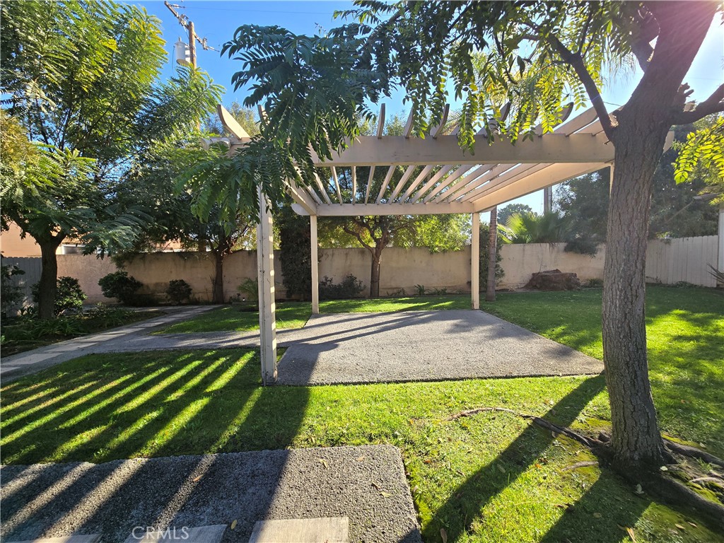 8026 Telegraph Road Downey, CA 90240 - Photo 25 of 26 a view of a backyard with a plants and large tree