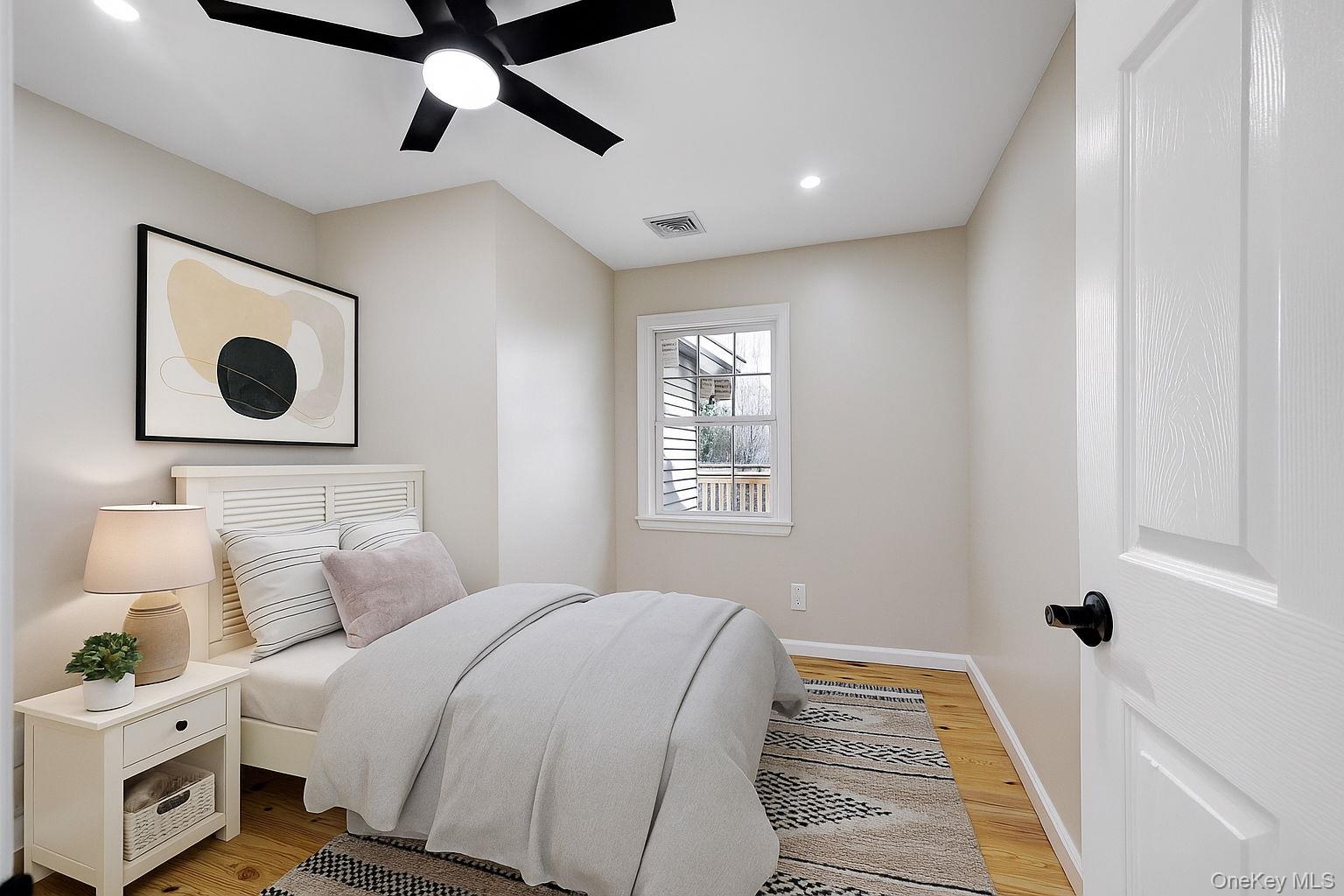 80 Kitz Road Monticello, NY 12701 - Photo 16 of 39 a bedroom with a bed and a window