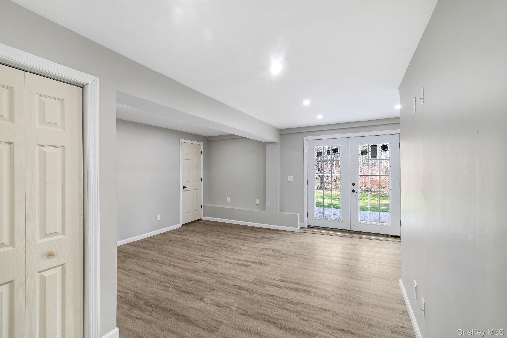 80 Kitz Road Monticello, NY 12701 - Photo 24 of 39 wooden floor in an empty room with a window