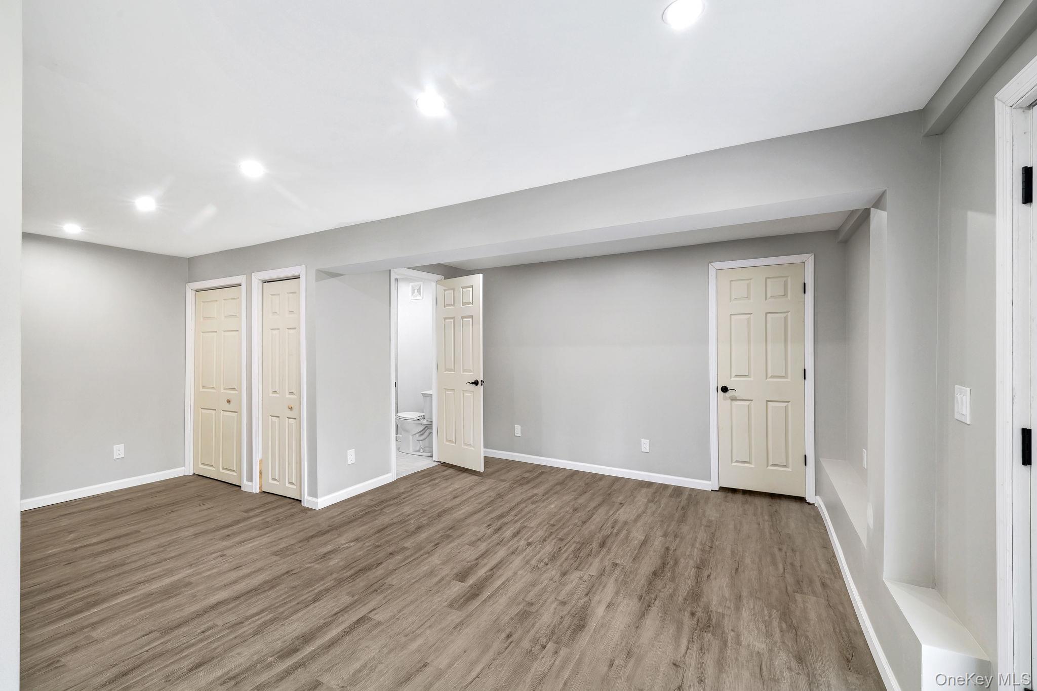 80 Kitz Road Monticello, NY 12701 - Photo 25 of 39 a view of an empty room with wooden floor