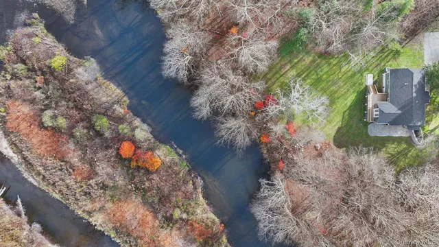 a view of a house with a big yard