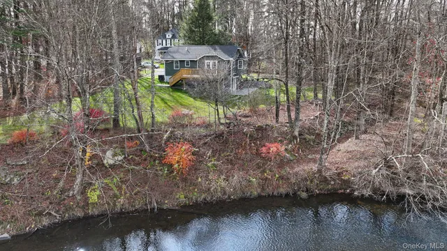 a view of a lake in middle of the house