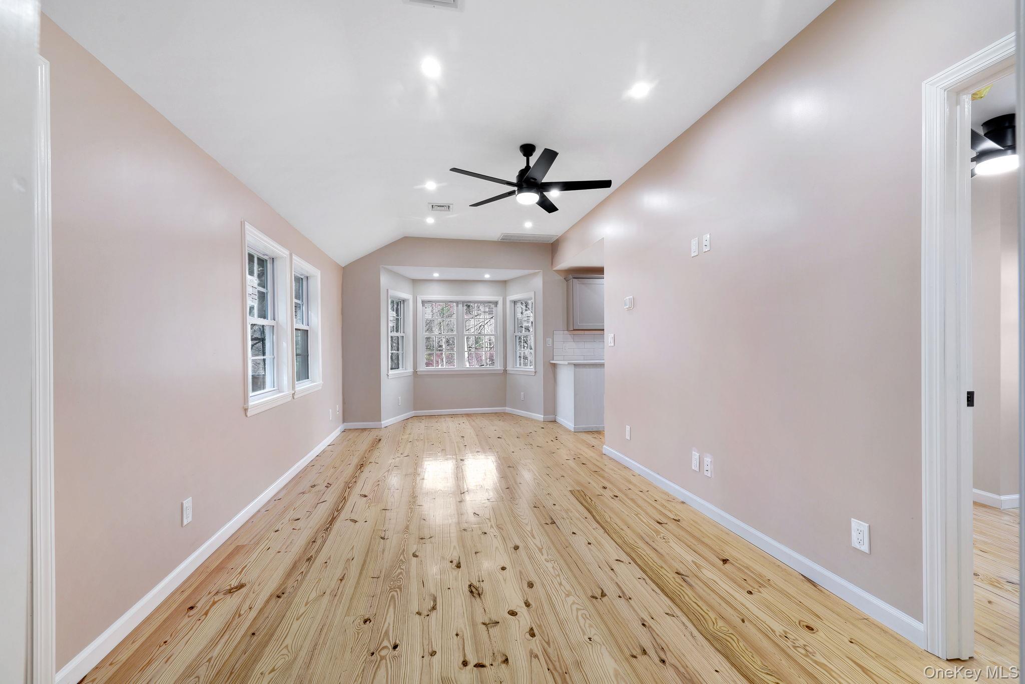 80 Kitz Road Monticello, NY 12701 - Photo 9 of 39 wooden floor in an empty room with a window