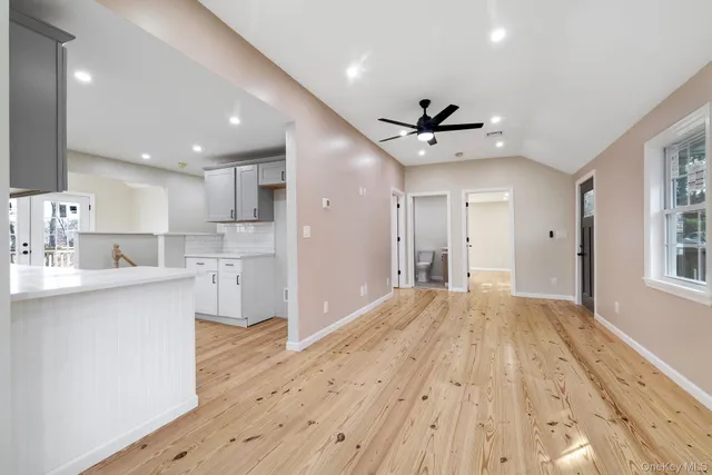 a kitchen with a sink stove and microwave