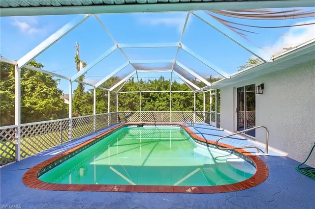 a view of a house with a swimming pool