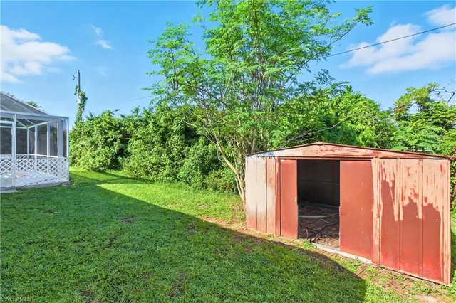 a view of backyard with green space