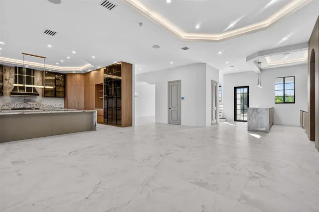 a bathroom with a shower and a sink