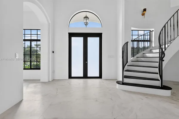 an empty room with windows