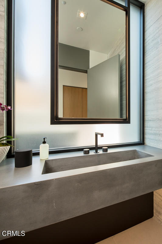 1746 Hanscom Drive South Pasadena, CA 91030 - Photo 17 of 58 a bathroom with a sink and a mirror