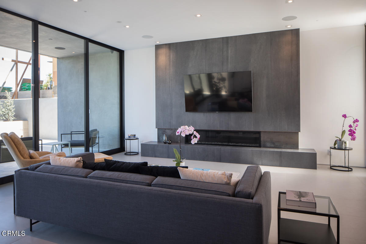 1746 Hanscom Drive South Pasadena, CA 91030 - Photo 20 of 58 a living room with furniture and a flat screen tv