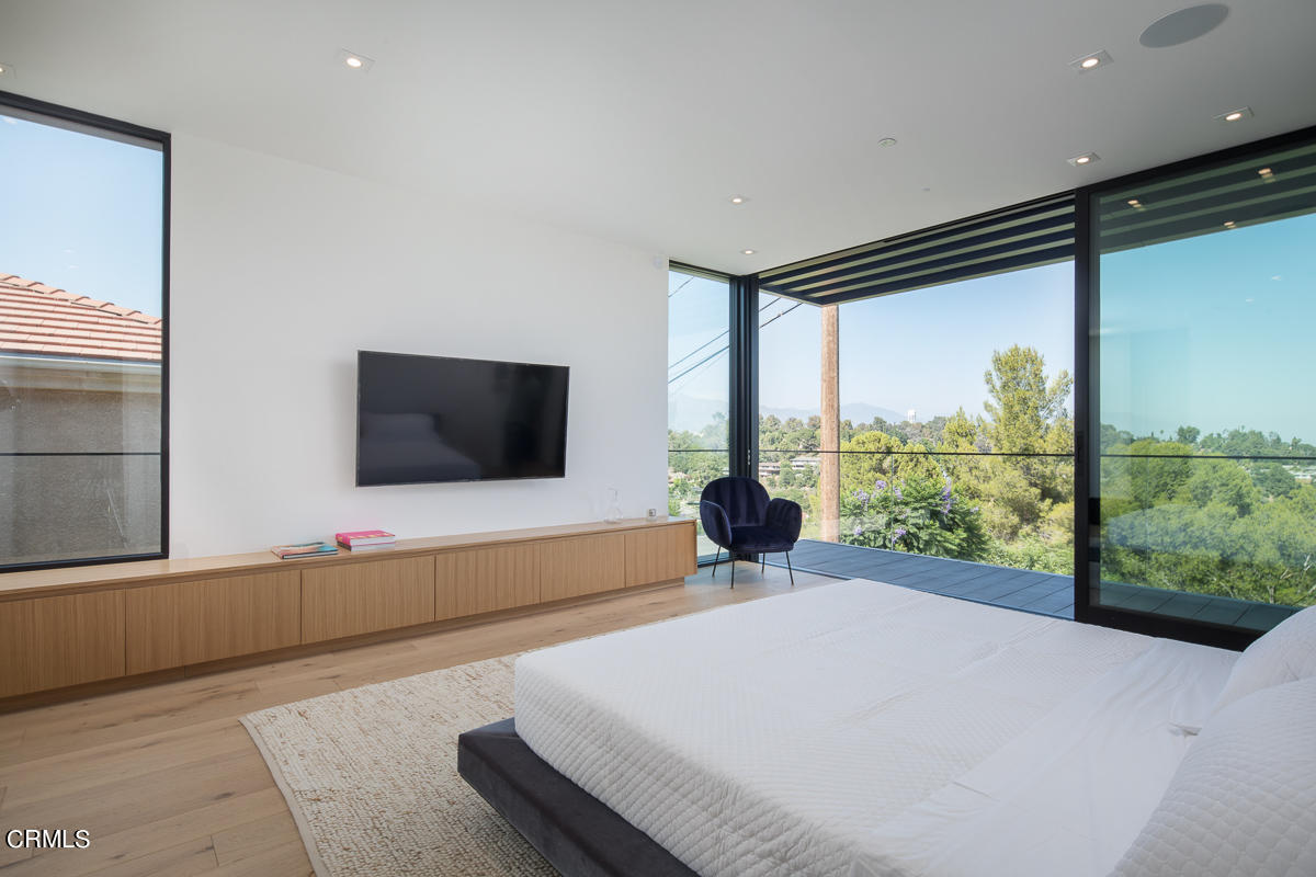 1746 Hanscom Drive South Pasadena, CA 91030 - Photo 27 of 58 a living room with a large window and a flat screen tv