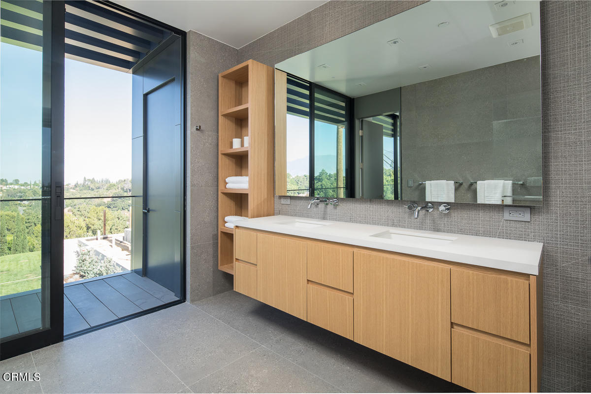 1746 Hanscom Drive South Pasadena, CA 91030 - Photo 31 of 58 a bathroom with sink and mirror