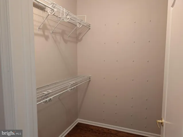 a view of a room with racks on the wall