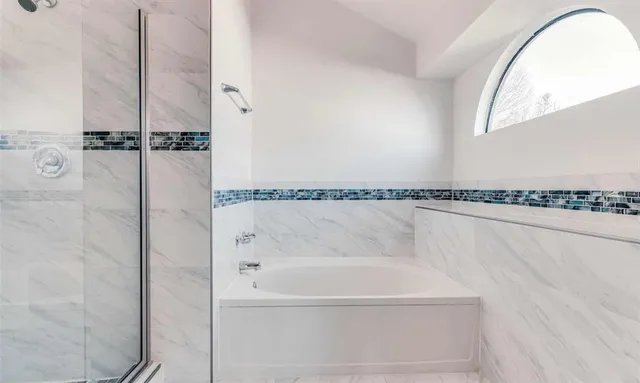 a close view of a bathtub in bathroom