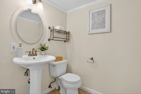 a view of a patio with table and chairs and potted plants