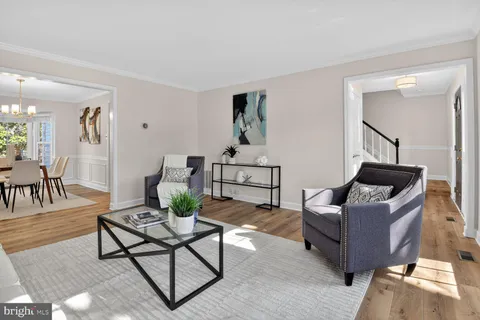 a living room with furniture and a couch