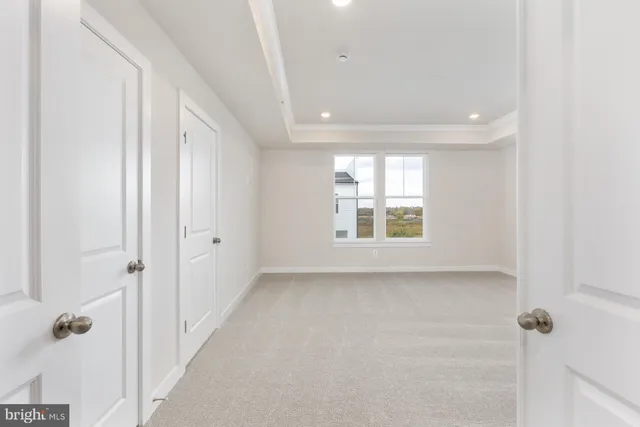 a bathroom with double sink and a mirror