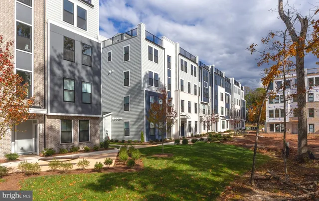 a view of a large building with a yard